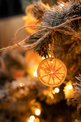 The Christmas tree is decorated with dried oranges.