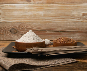 Buckwheat Flour Pile in Wood Bowl, Dry Buck Wheat Powder, Buckwheat Flour on Wooden Rustic Background