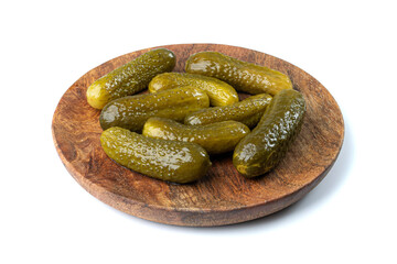 Fototapeta premium Pickled Cucumbers on Wood Plate Isolated, Fermented, Marinated Vegetables, Gherkins