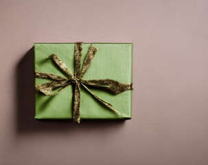 Elegant Christmas Gifts: Top View of Green Wrapped Present with Sparkling Gold Ribbon Created with Generative AI and Other Techniques