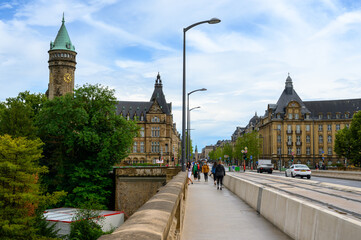 Fototapeta premium A view of the city of Luxembourg from the Adolphe Bridge. The towering building is the State Bank and Savings Fund headquarters (Spuerkeess). Luxembourg, 2021/07/04.