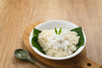 Ketan Kelapa Parut, Indonesian traditional snack, made from steamed glutinous rice and served with grated coconut

