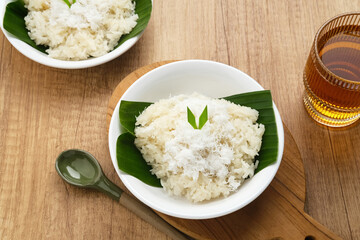 Ketan Kelapa Parut, Indonesian traditional snack, made from steamed glutinous rice and served with grated coconut
