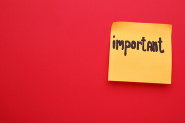 Paper note with word Important on red background, top view. Space for text
