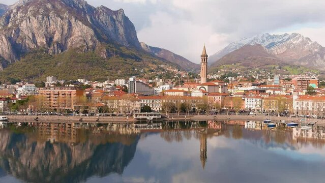Aerial beautiful sunset cityscape of Lecco town, Lombardy, Italy, Europe