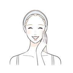 笑顔で頰を触る女性　スキンケア