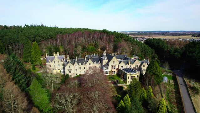 Findhorn foundation Cluny hill landmark building aerial view, zoom out, day
