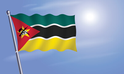 Mozambique flag against a blue sky