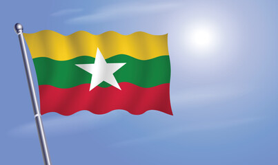 Myanmar flag against a blue sky