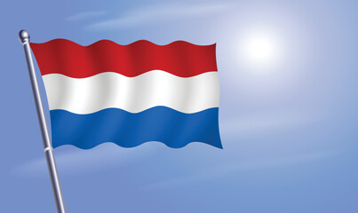 Netherlands flag against a blue sky