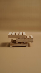 Stack of piled up construction square wood