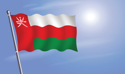 Oman flag against a blue sky