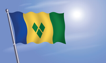 St. Vincent Grenadines flag against a blue sky