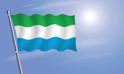 Sierrra Leone flag against a blue sky