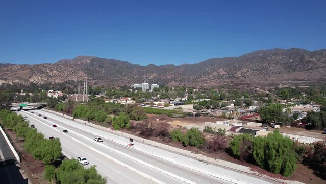 Sylmar, Los Angeles CA USA. Aerial View of Traffic on Highway 205 and Suburban Neighborhood