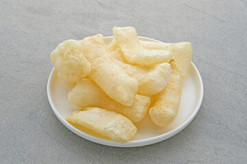 Rambak, or kerupuk kulit is Indonesian traditional crackers. Made from soft inner skin of cattle (Cow or Water Buffalo). 
