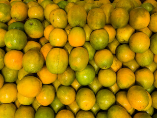 Fresh orange in the supermarket. Vegetables and fruits exposed for consumer choice. Brazilian hortifrutti. Top view.