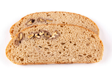 Two slices of whole wheat flour bread on a white insulated background. Top view, close-up. Bread without yeast, with sourdough. Proper nutrition. Template, design.