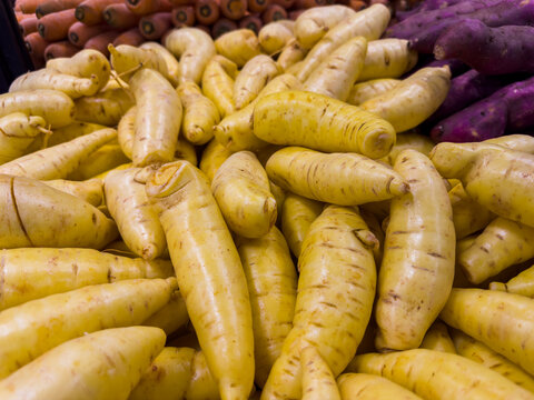 Fresh yellow baroa potatoes in the supermarket. Vegetables and fruits exposed for consumer choice. Brazilian hortifrutti