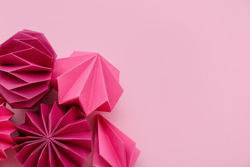 Paper Christmas balls on pink background, closeup