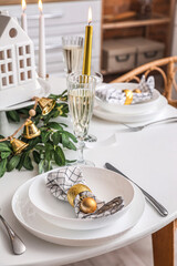 Christmas table setting with ball in kitchen, closeup