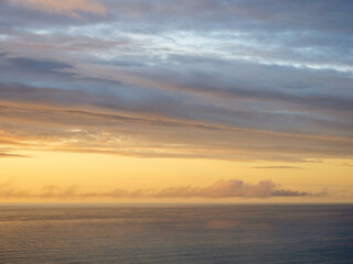 Naklejka premium Sunset clouds over Tasman sea