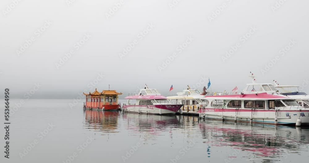 Wall mural Foggy weather in Sun moon lake jetty pier at Nantou of Taiwan