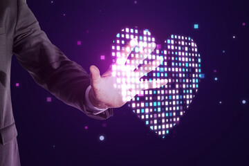 Close up of businessman hand using abstract glowing purple pixel heart on blurry background. Health, cardiology and game interface concept.