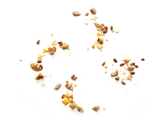 Abstract scattered cereals, seeds, muesli, grains on white background, top view - 553670526