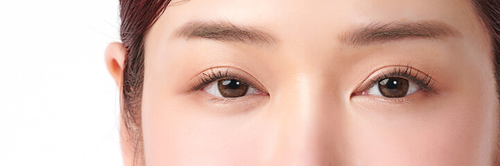 close up of beauty asia woman eye on white background.