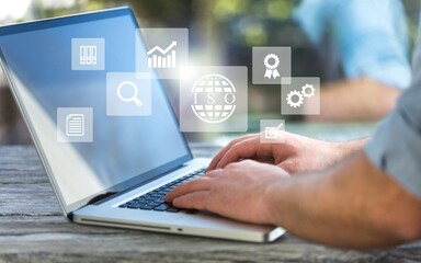 Young smart business person works on computer