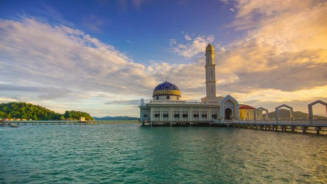 Time-lapse of beautiful floating mosque at Pangkor Island during sunrise. Tilt Down effect