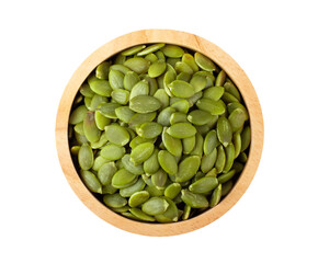 Pumpkin seeds in wood bowl isolated on transparent png