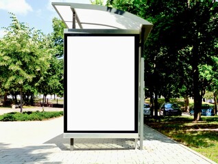 bus shelter at a busstop. blank billboard ad display. empty white lightbox sign. urban setting. old...