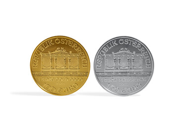Austrian Silver and Gold Philharmonic Investment Coins on White Background