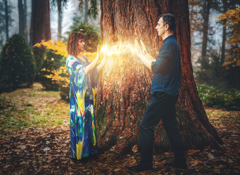 Man and woman heal each other with healing energy. Pranic healing.