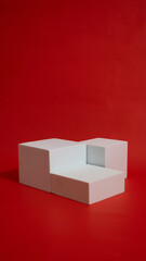 Realistic white cube pedestal podium set in red background. Minimal scene for product display presentation. Stage for showcase.