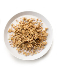 bowl of sweet cereal breakfast- Muesli - Avena - Oatmeal - with milk, isolated on white background, top view