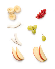 Fruit element - Apple slices, Red grape, banana pieces and grapes, isolated on white background. Top view