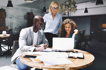 Businesspeople working at a table