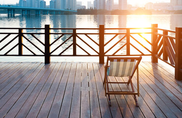 Deck chair on deck by the sea