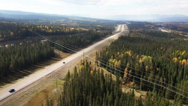 Infinite vastness of the Yellowhead Highway 5 in Alberta on a overcast Day in the autumn