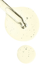 Pipette and drops of cosmetic serum for the skin. Liquid body care product. Isolated on a white background.
