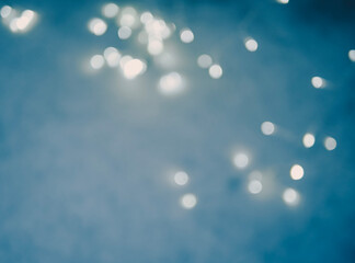 Dark blue round bokeh background copy space