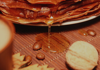 Sweet chocolate pancakes with nuts, honey and chocolate.