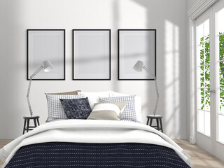 bedroom with 3 blank Frames on wall