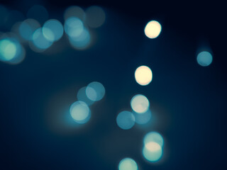 Dark blue round bokeh background copy space