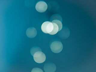 Dark blue round bokeh background copy space