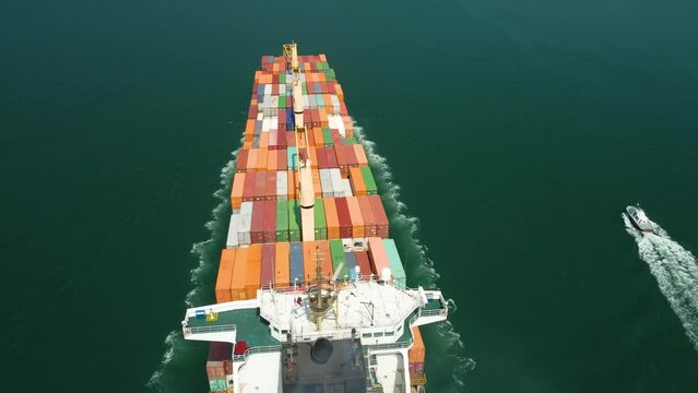 Top down view of a huge cargo ship - vessel filled with containers 