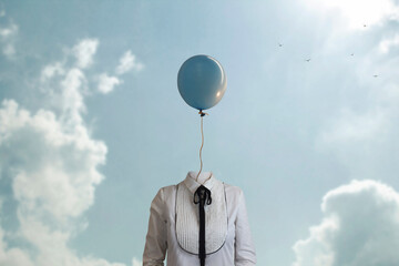 surreal woman has a balloon instead of a head that flies free in the blue sky